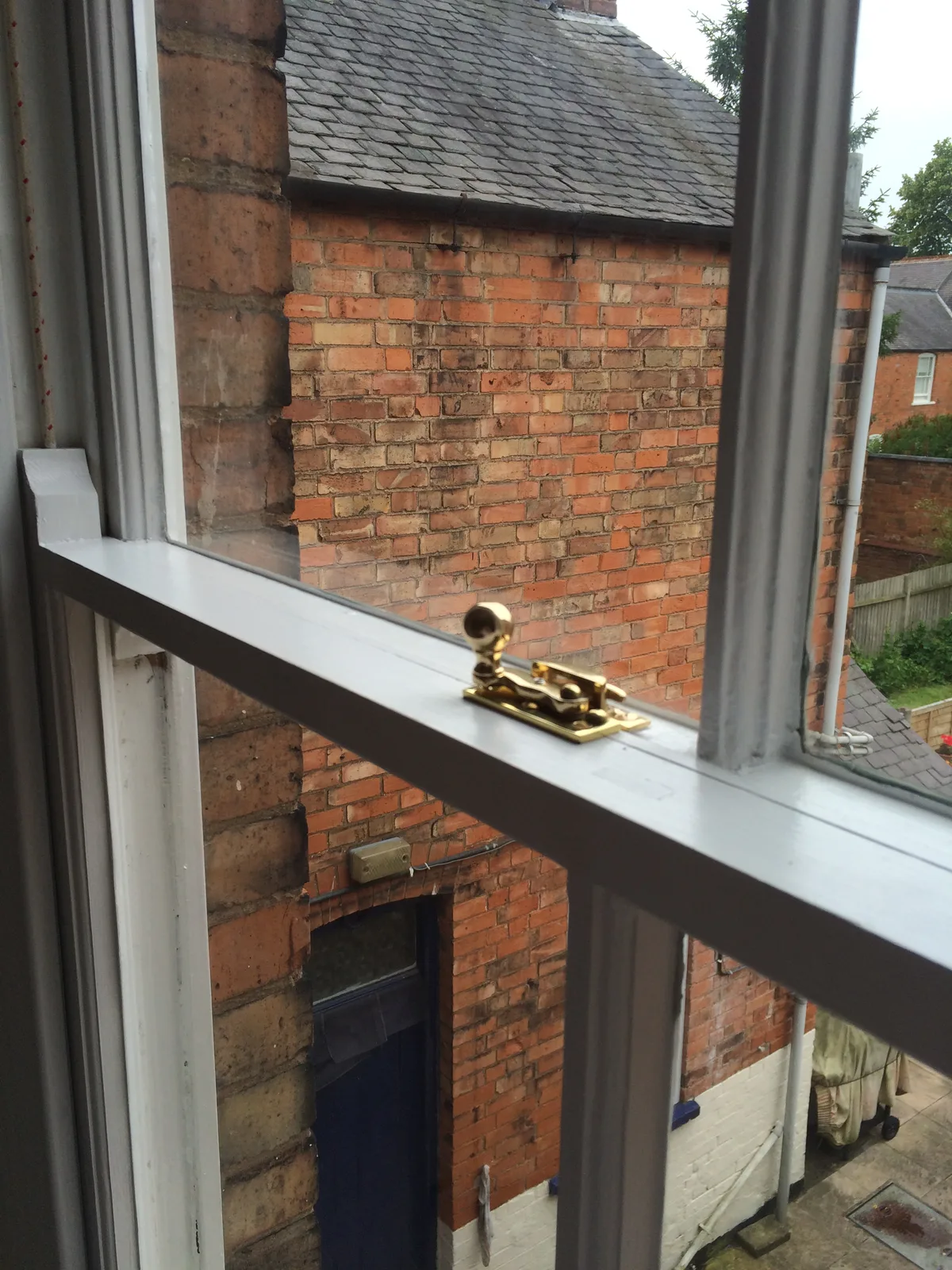 Damaged sash window timber before repair