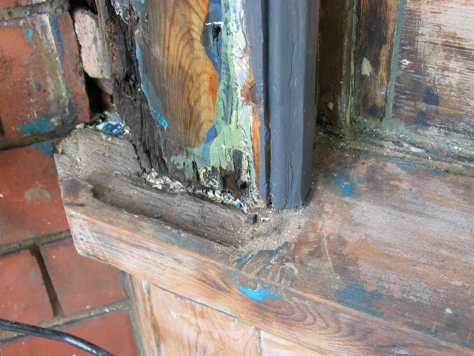 Neglected Victorian bay window before restoration