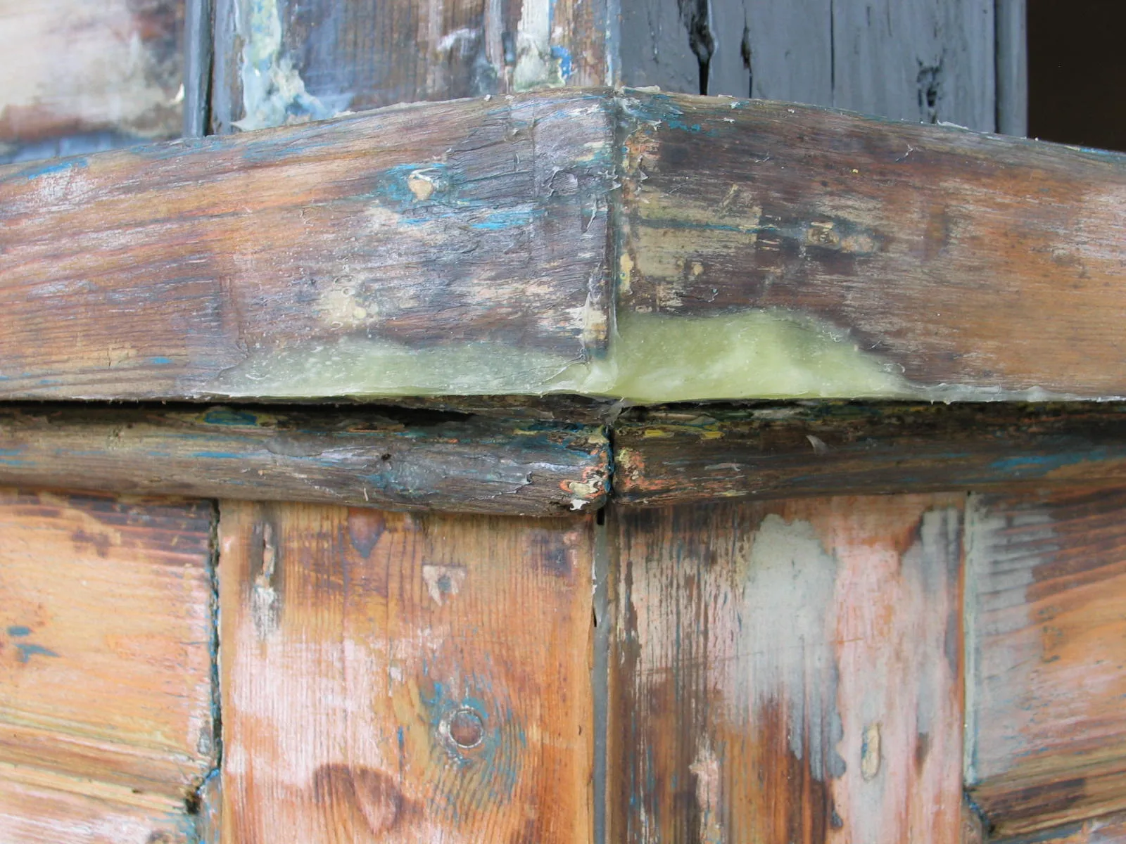 Decayed timber on the bay window frame